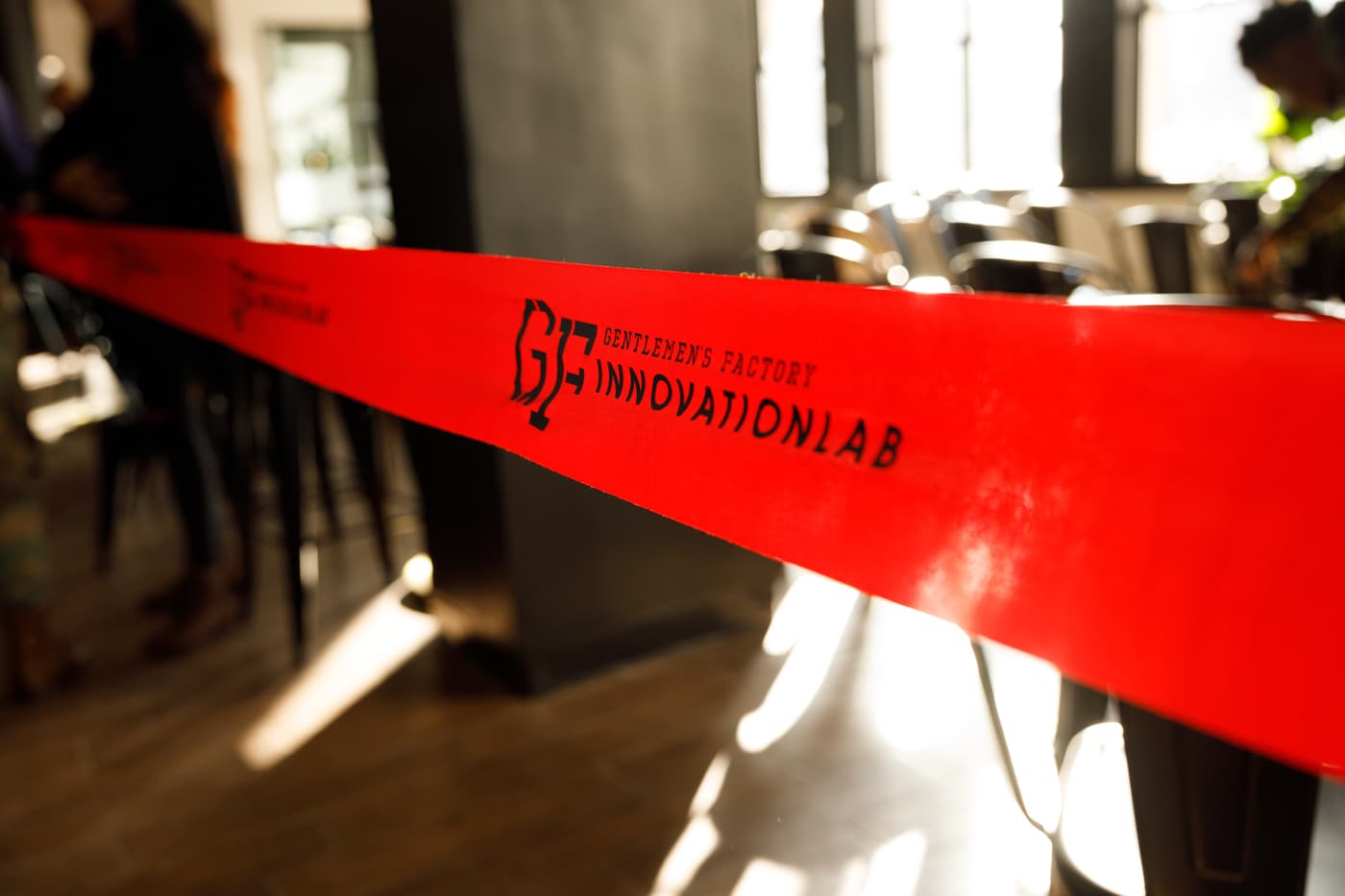 The ribbon for the Gentlemen's Factory Innovation Lab opening.